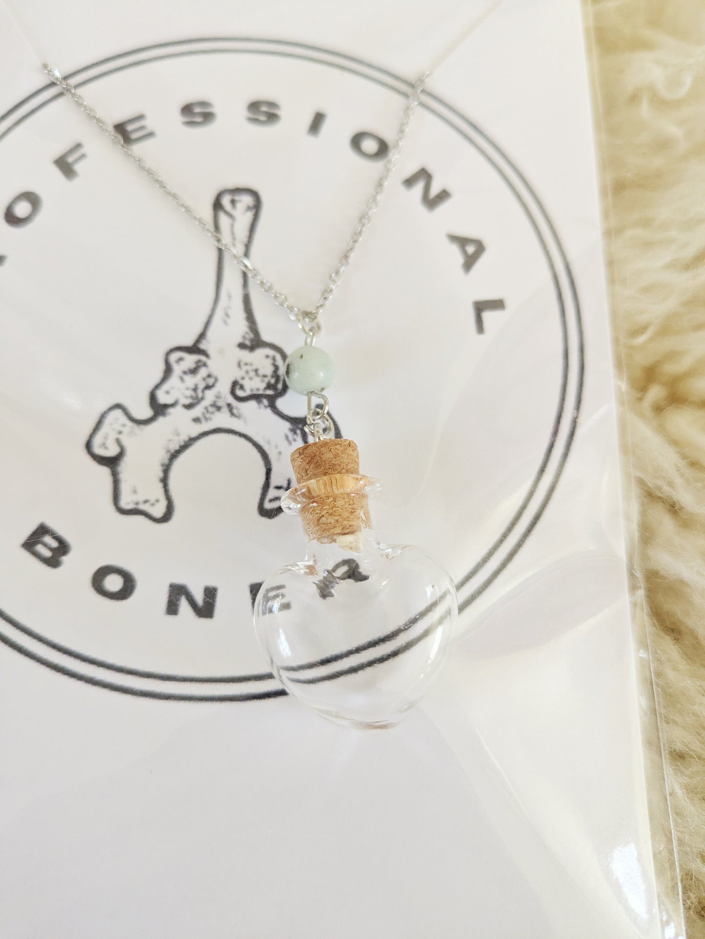 Rat Tooth Vial Necklace